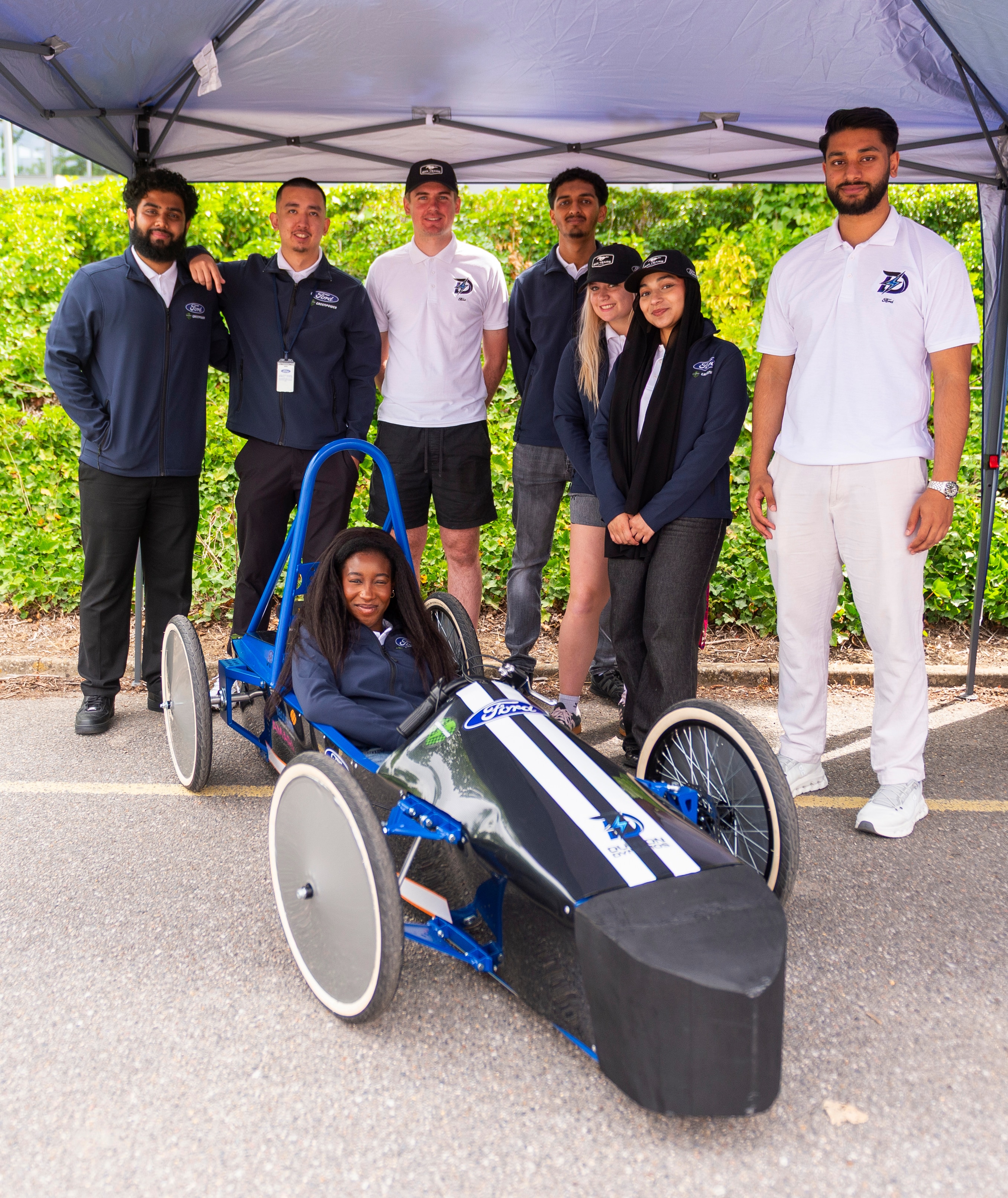 The Dunton Dynamos with the prototype F24+ vehicle they had on display at Dunton for the younger students to see